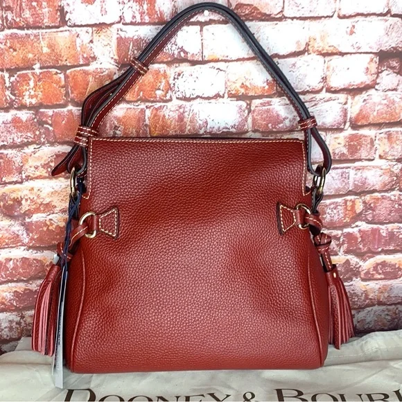 Dooney & Bourke Wine Red Pebbled Tassel Shoulder Bag